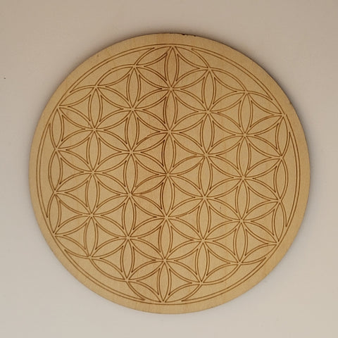Wooden Flower Of Life Crystal Grid known for amplifying energy and setting intentions