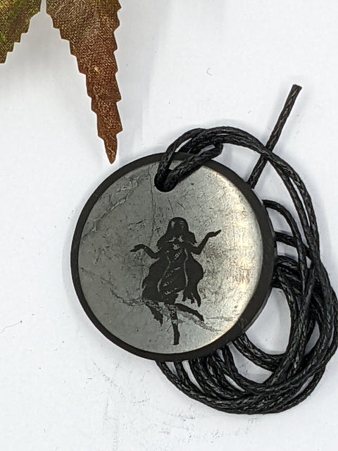Shungite Virgo zodiac sign pendant necklace on a white background, for focus and precision.