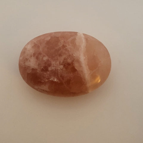 Smooth and Polished Strawberry Calcite Palm Stone for Love and Emotional Healing