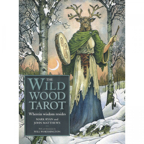 The Wild Wood Tarot deck cover featuring a mystical figure in a snowy forest, holding a shield and staff, symbolizing wisdom and nature.