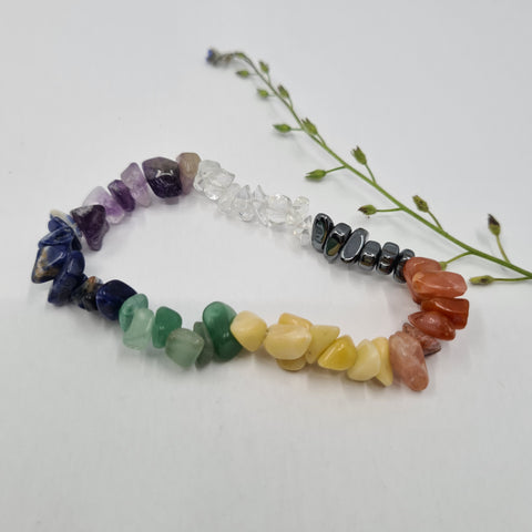 Chakra Balancing Crystal Chip Bracelet with vibrant gemstone chips on a white background.