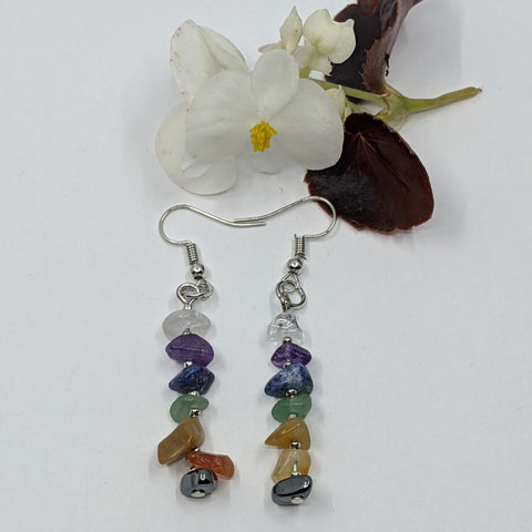 Chakra Balancing Crystal Chip Earrings featuring vibrant gemstone chips on a white background.