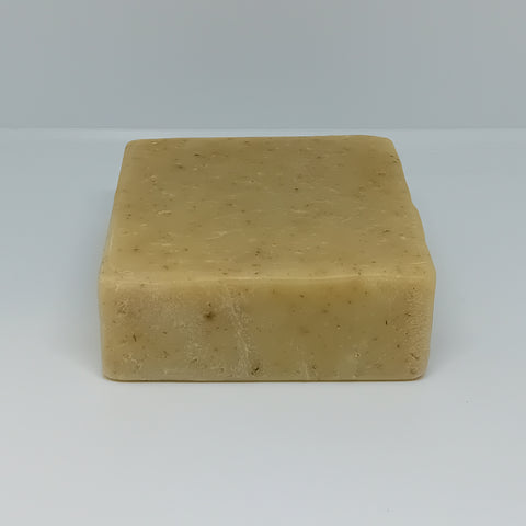 Down To Earth Handmade Soap Bar, 100% natural with vetiver, orange, and clary sage, enriched with chamomile for a calming and grounding experience.