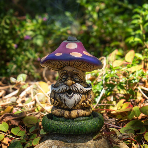Mushroom Backflow Incense Burner made from cold cast resin, featuring a gnome figure under a red and white spotted mushroom. Used with incense cones for meditation, relaxation, and creating a magical smoke effect.