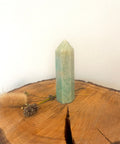 Amazonite Tower Tumbled Stone – a polished Amazonite tower crystal with soothing green-blue tones, known for calm, balance, emotional healing, and supporting honest communication.