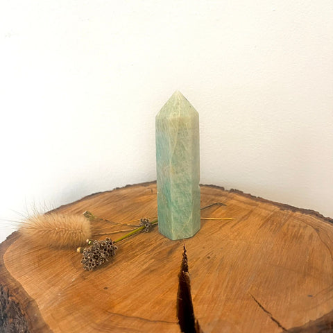 Amazonite Tower Tumbled Stone – a polished Amazonite tower crystal with soothing green-blue tones, known for calm, balance, emotional healing, and supporting honest communication.