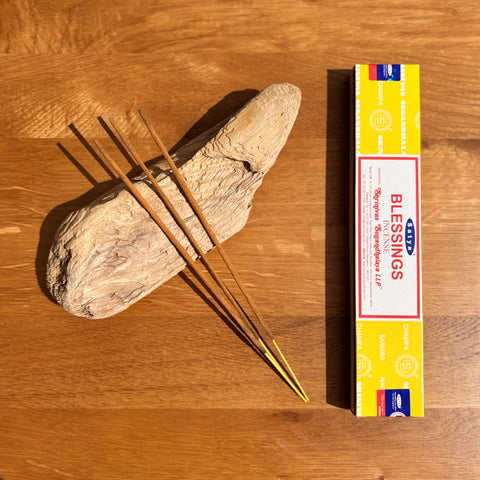 Satya Blessings Incense Sticks 15g box on a wooden background, designed to invoke grace and promote spiritual peace.