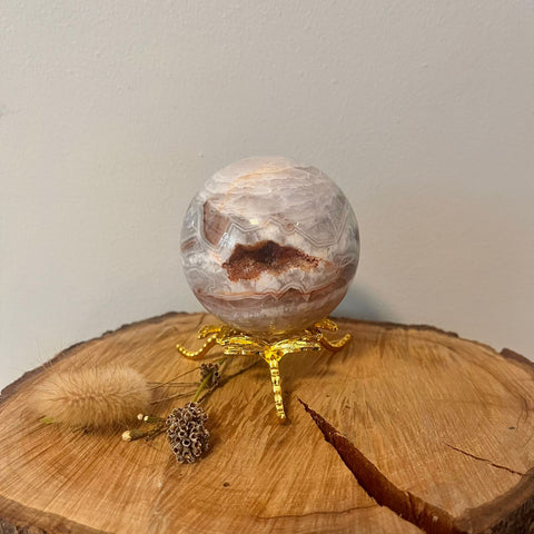 Citrine Quartz Agate Sphere – a polished crystal sphere combining citrine, quartz, and agate, with natural earthy tones, known for positivity, clarity, grounding, and balance.