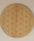 Wooden Flower Of Life Crystal Grid known for amplifying energy and setting intentions