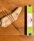 Satya Fortune Incense Sticks 15g box on a wooden background, crafted to attract prosperity and positive energy.