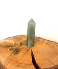 Green Aventurine Tower – a polished aventurine tower with soft green tones, known for prosperity, emotional calm, renewal, and growth.