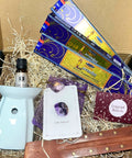Gift box with lavender incense sticks, amethys stone, lavender oil, oil burner and incense stick holder.