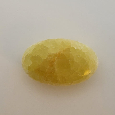 Smooth and Polished Lemon Calcite Palm Stone for Clarity and Focus