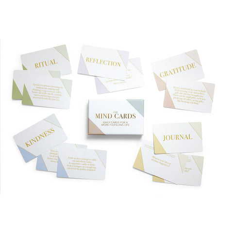 LSW Mind Cards set with categories like Kindness, Ritual, Reflection, Gratitude, and Journal, displayed around the box with gold lettering.