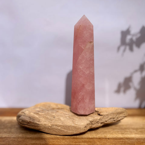 Rose quartz crystal tower on white background — Fragrant Heaven