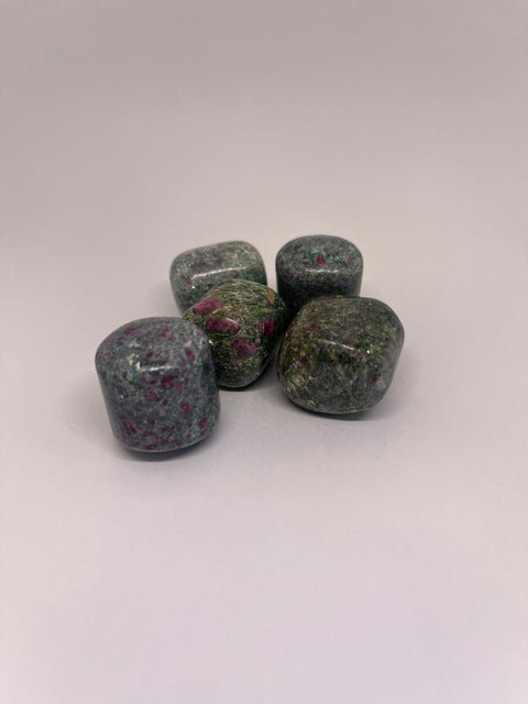 Ruby in Fuchsite Tumbled Stones featuring smooth, polished crystals with vibrant green and pink hues, known for their powerful combination of emotional healing, vitality, and spiritual growth.