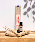 Satya Incense Protection Bundle showcasing White Sage Satya Incense, claro sage essential oil and a black obsidian crystal mounted on a piece of driftwood with a white background.