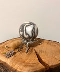 Shellstone Jasper Sphere for calm, balance, and grounding energy