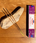 Satya Sunrise Incense Sticks 15g box on a wooden background, ideal for energizing morning rituals and meditation.