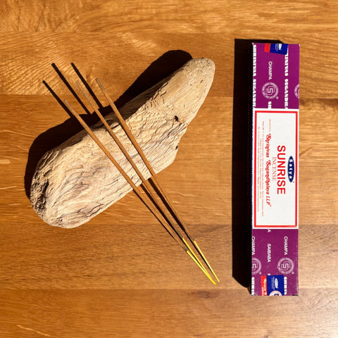 Satya Sunrise Incense Sticks 15g box on a wooden background, ideal for energizing morning rituals and meditation.
