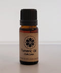 Tumeric Essential Oil in Amber Glass Bottle by Always Natural