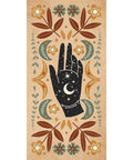 Decorative card from 'Witch Magick' featuring a celestial hand with moon and stars surrounded by floral and botanical elements.