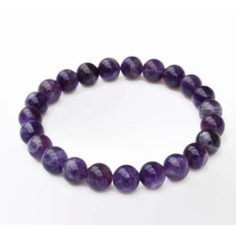Polished round amethyst beads on stretch bracelet showing deep purple colour — Fragrant Heaven