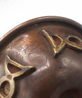 Close-up of Triple Moon copper ritual bowl – engraved detail