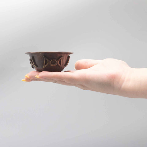 Small Triple Moon ritual bowl shown in hand for scale