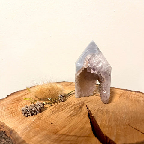 Blue Lace Agate Tower with Druzy – a polished blue lace agate tower with soft blue banding and a natural druzy cavity, known for calm, peace, communication, and harmony.