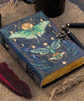 Butterfly leather journal vintage notebook styled with pen and writing accessories