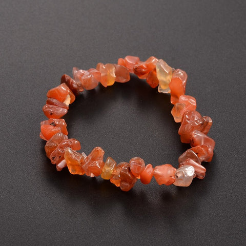 Carnelian Chip Bracelet — image of a stretch bracelet made of natural orange-red carnelian crystal chips, known for boosting confidence, creativity, and passion.