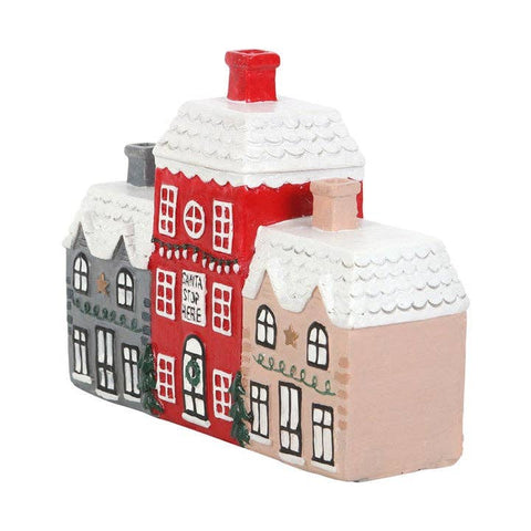 Side view of Christmas Village Incense Cone Holder showing three connected houses.