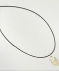Natural citrine rough crystal pendant in silver plated cap on cord chain, white background — Fragrant Heaven