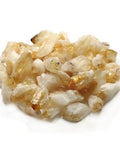 Collection of natural citrine raw stone pieces with polished points showing range of warm golden yellow tones — Fragrant Heaven