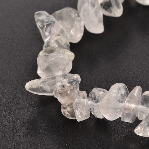 Clear Quartz Chip Bracelet closeup detail— image of a stretch bracelet made of natural clear quartz crystal chips, known for clarity, balance, and amplifying energy and intentions.