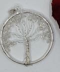 Tree of Life Clear Quartz Chip Pendant with quartz chips in a Tree of Life frame on a white background.