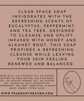 Back label of Clear Space Handmade Soap Bar, 100% natural with eucalyptus, peppermint, and tea tree essential oils, infused with honey and alkanet root for a refreshing cleanse.