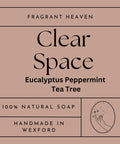 Front label of Clear Space Handmade Soap Bar, 100% natural with eucalyptus, peppermint, and tea tree essential oils, infused with honey and alkanet root for a refreshing cleanse.