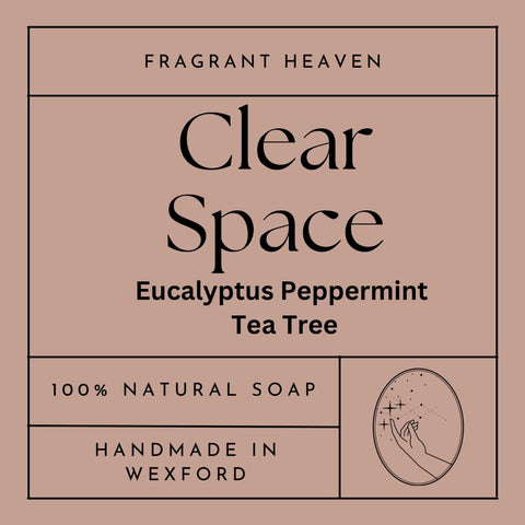 Front label of Clear Space Handmade Soap Bar, 100% natural with eucalyptus, peppermint, and tea tree essential oils, infused with honey and alkanet root for a refreshing cleanse.