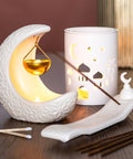Crescent moon oil burner with incense holder and lantern