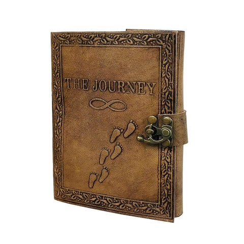 Embossed leather journal diary with the journey design and footprint detail on genuine leather cover
