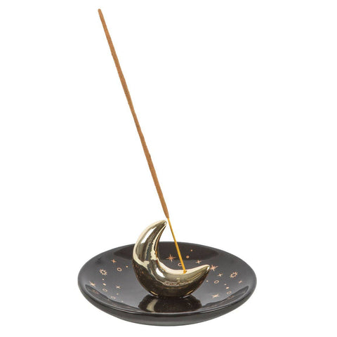 Gold Crescent Moon Ceramic Incense Holder with incense stick in place.
