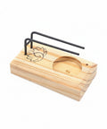Wooden palo santo burner with lotus flower design and metal holder