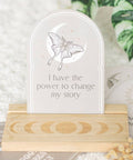 Luna Moth Affirmation Card displayed on wooden moon phase stand with the message “I have the power to change my story.”