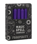 Box of purple 'Magic Spell Candles' with 'Prosperity' text on a white background