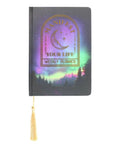 Front view of Manifest Your Life A5 Planner featuring forest night sky and gold lettering.