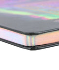 Edge detail of Manifest Your Life A5 Planner showing holographic page edges.