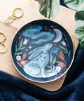 Mystical Midnight Hare Trinket Dish on wooden board with gold moon and hare earrings beside it
