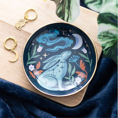 Mystical Midnight Hare Trinket Dish on wooden board with gold moon and hare earrings beside it